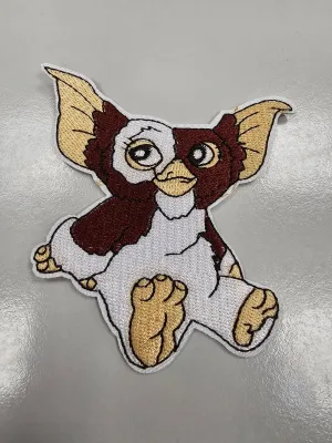 Patches - Gizmo sitting