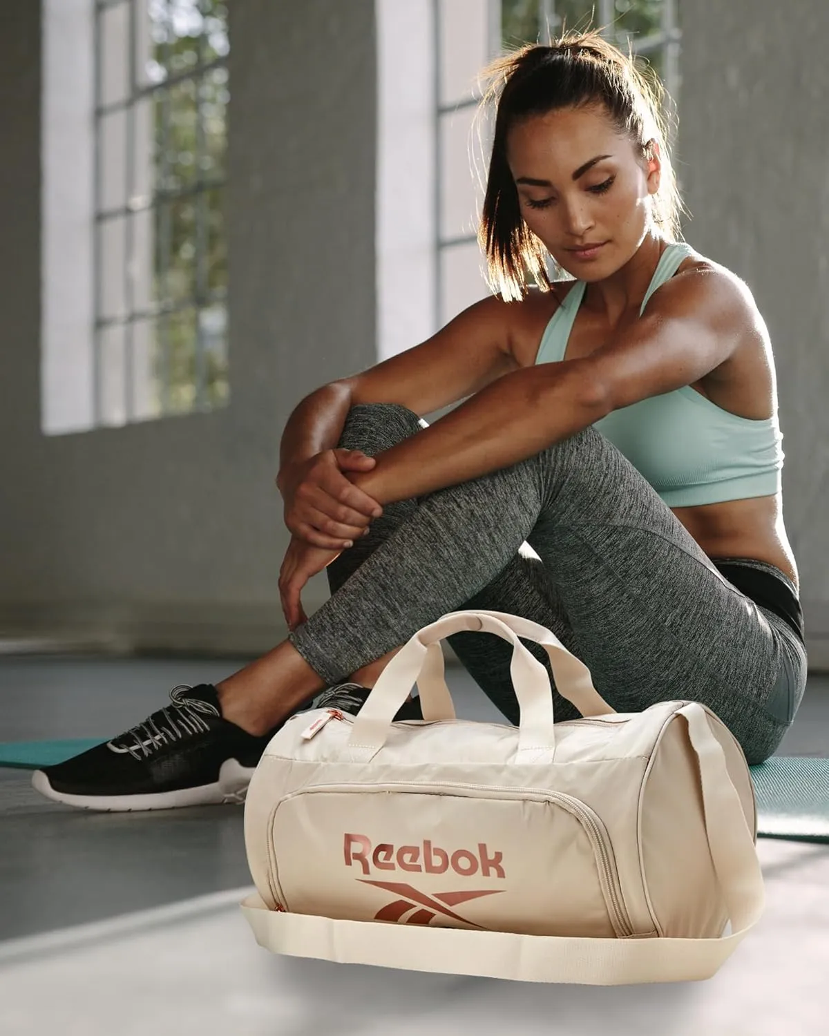 Reebok Duffle Bag – Gym Bag for Women & Men, Carry On and Overnight Duffle for Travel & Fitness, Size Small, Easton Beige